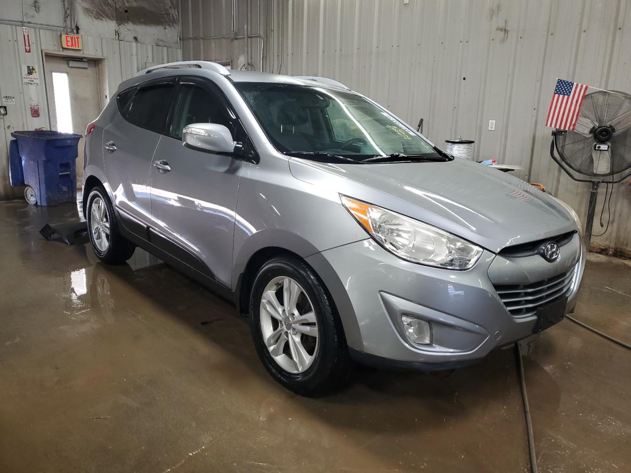 2013 Hyundai Tucson VIN KM8JUCAC7DU669153 Copart auction photo, side / front end damage thumbnail 4
