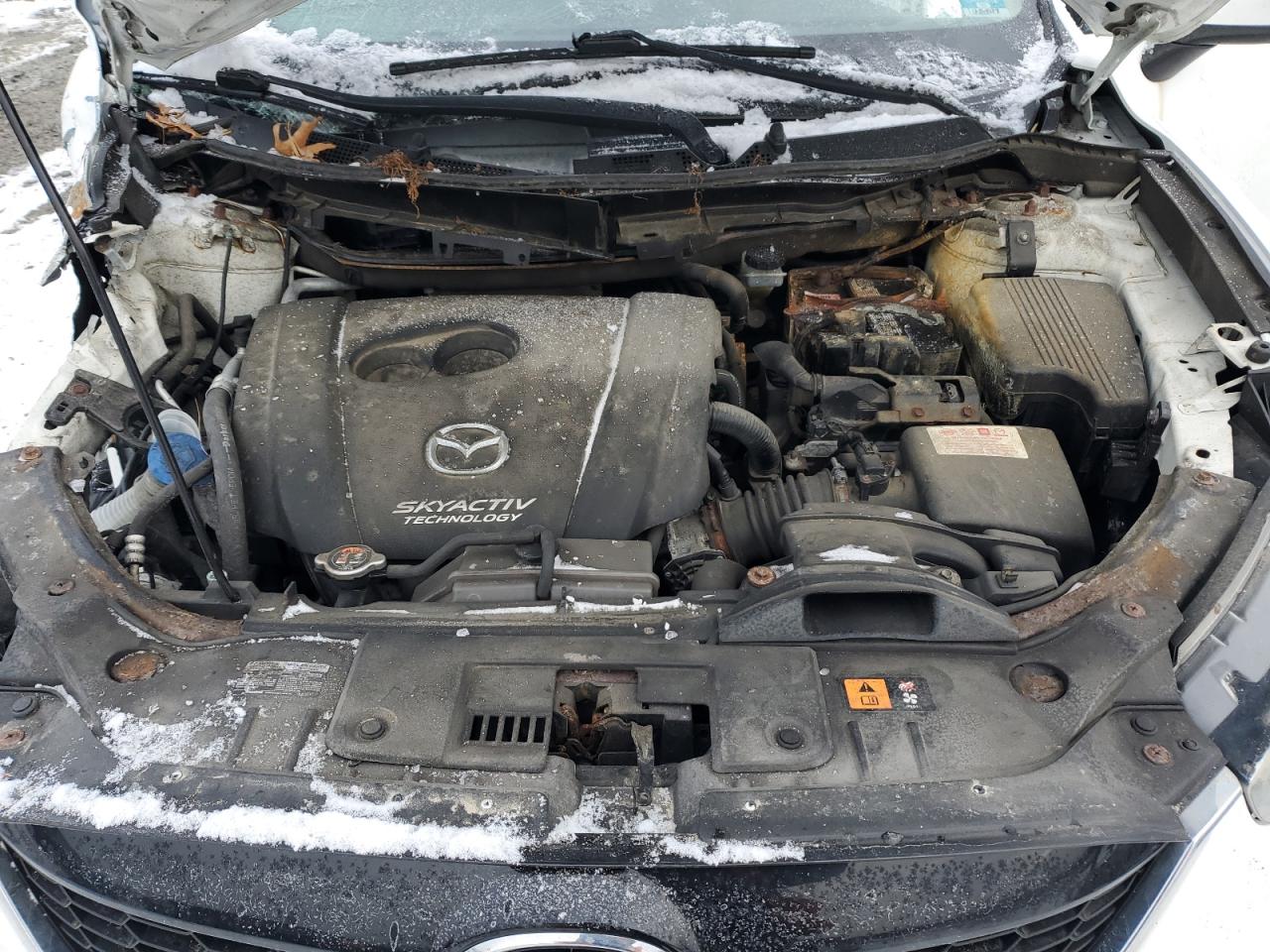 2015 Mazda CX-5 VIN JM3KE4CY3F0457579 Copart auction photo, front end / burn damage thumbnail 12