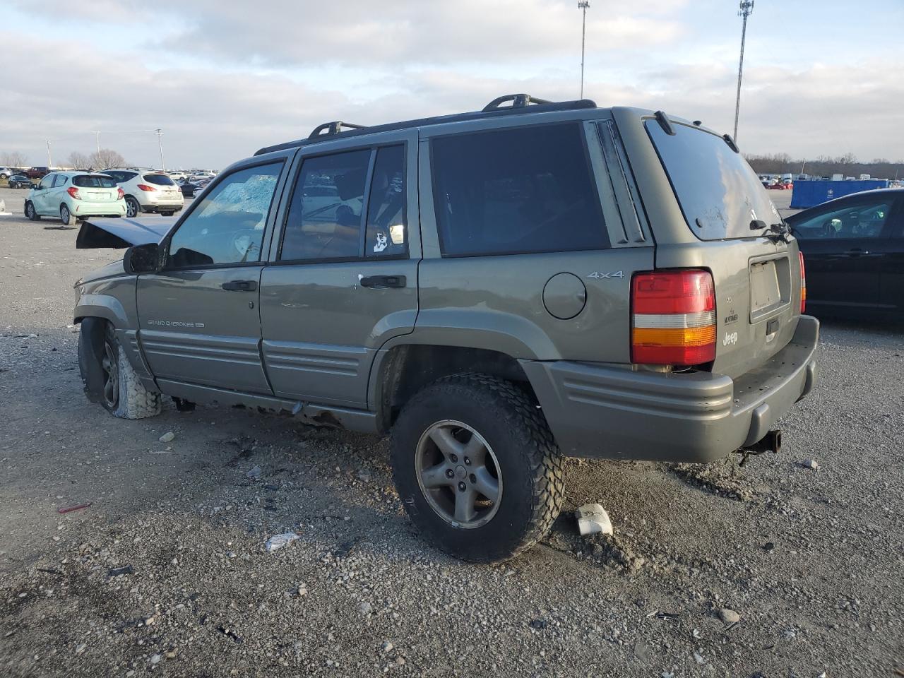 1998 Jeep Grand Cherokee VIN 1J4GZ48S2WC255218 Copart auction photo, all over damage thumbnail 2
