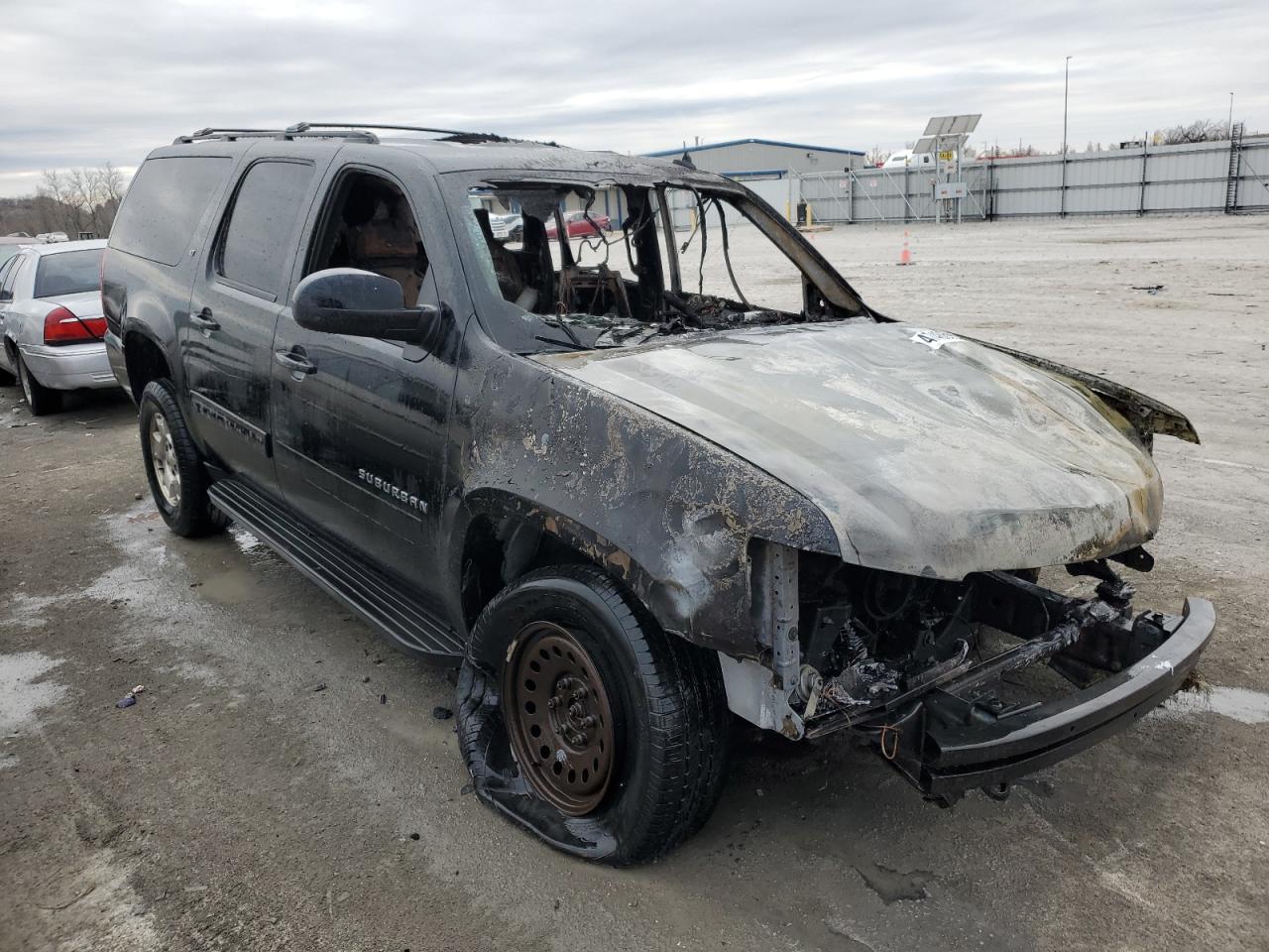 2012 Chevrolet Suburban VIN 1GNSKJE79CR315756 Copart auction photo, burn damage thumbnail 4