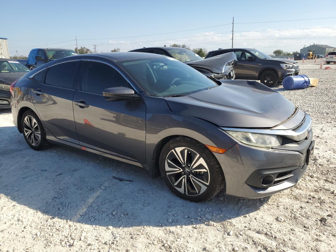 2016 Honda Civic VIN 2HGFC1F38GH642806 Copart auction photo, front end / side damage thumbnail 4