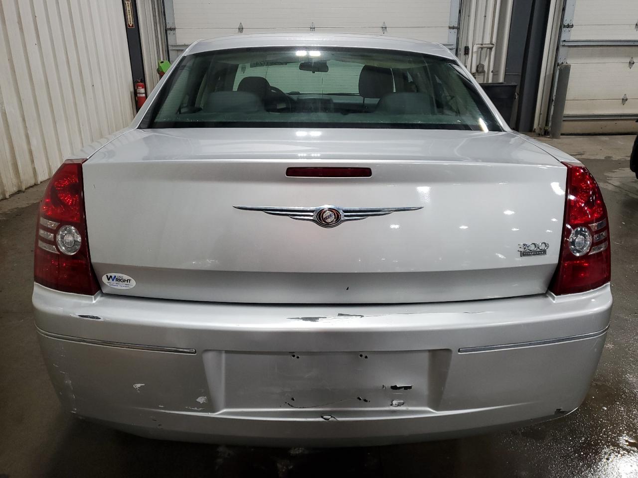2010 Chrysler 300 VIN 2C3CA4CD8AH123501 Copart auction photo, front end / side damage thumbnail 6