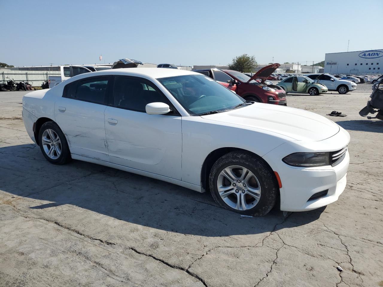 2015 Dodge Charger VIN 2C3CDXBG4FH776449 Copart auction photo, side / front end damage thumbnail 4
