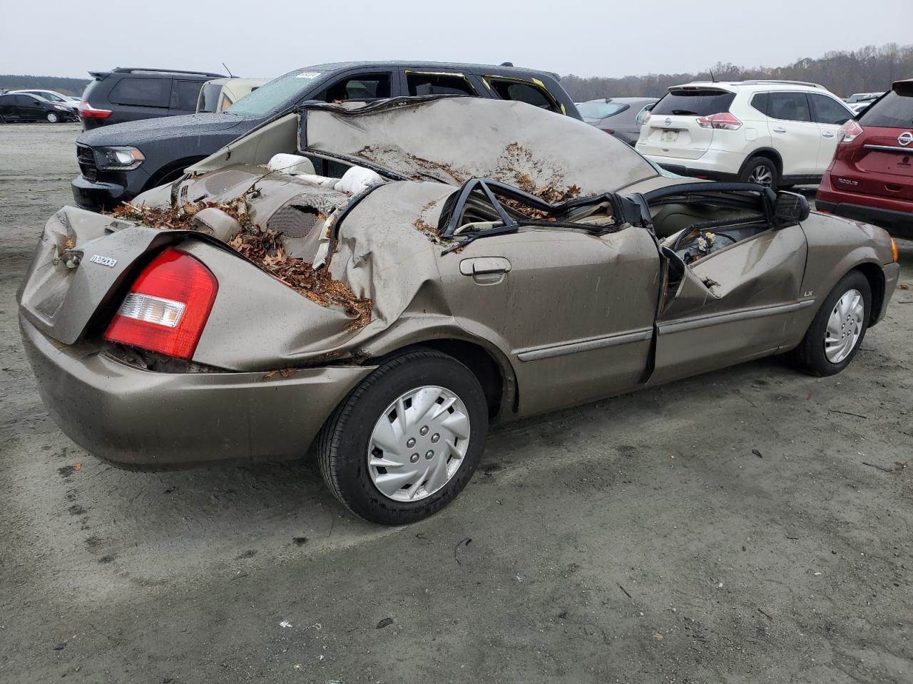 2000 Mazda Protege VIN JM1BJ2226Y0296668 Copart auction photo, top/roof / side damage thumbnail 3