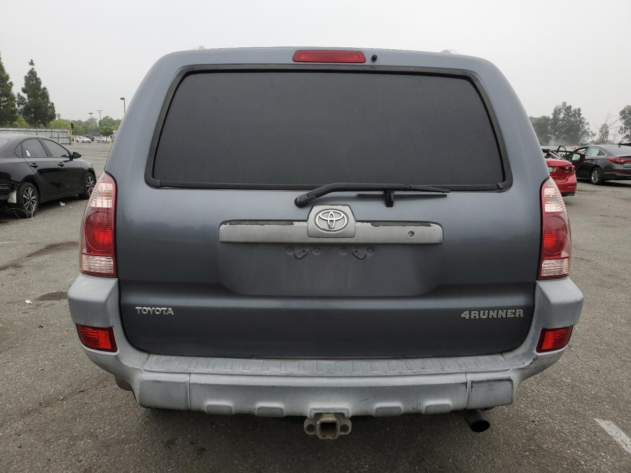 2003 Toyota 4Runner VIN JTEZU14R730010826 Copart auction photo, side / front end damage thumbnail 6