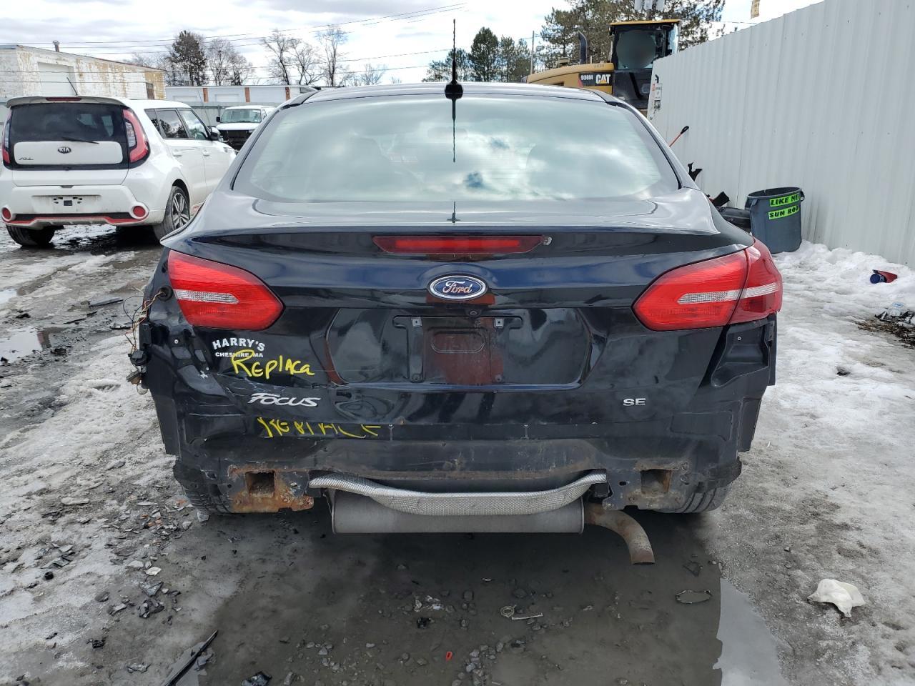 2016 Ford Focus VIN 1FADP3F21GL218812 Copart auction photo, rear end / minor dent/scratches damage thumbnail 6