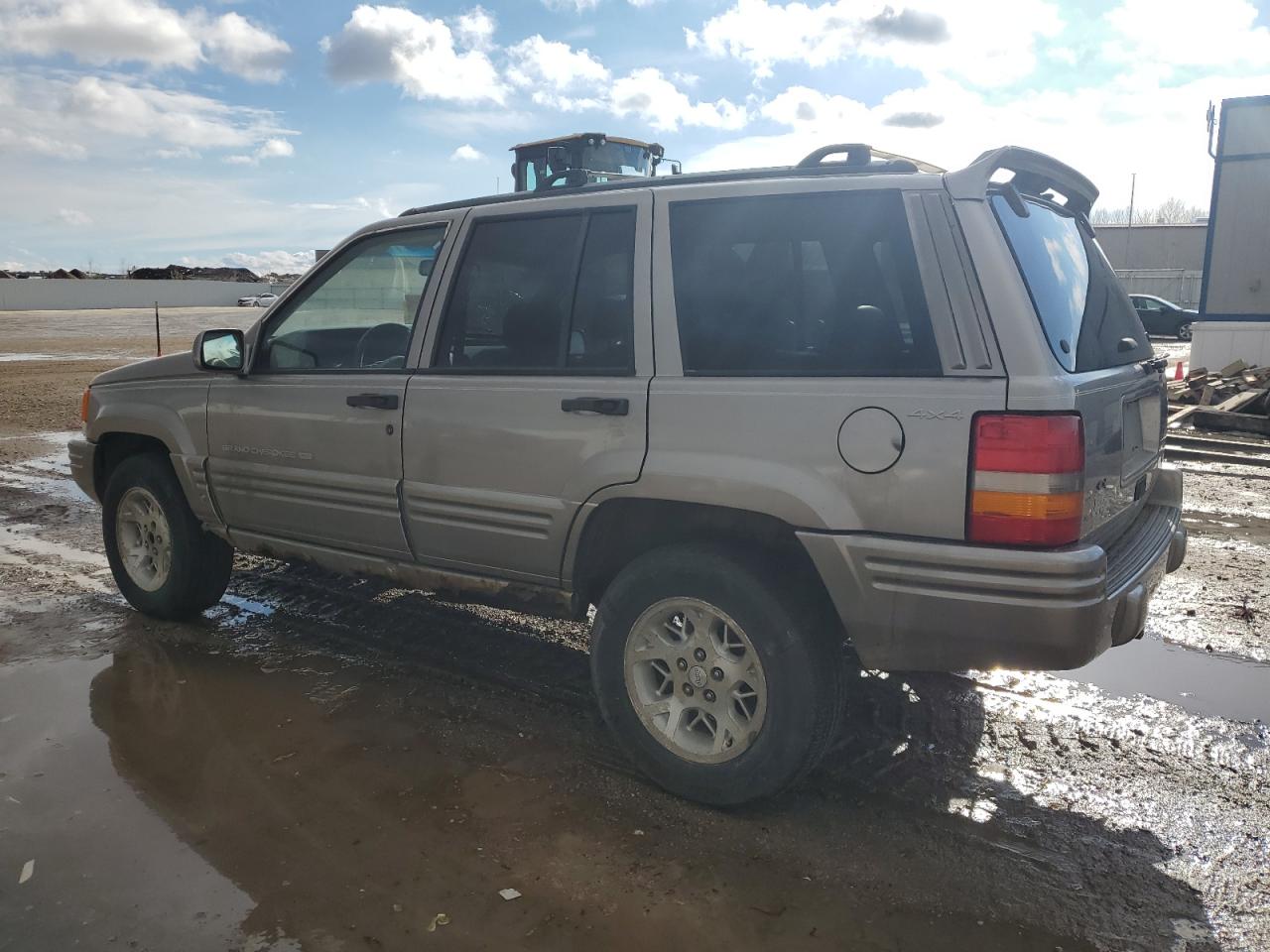 1997 Jeep Grand Cherokee VIN 1J4GZ78Y0VC556381 Copart auction photo, side / undercarriage damage thumbnail 2