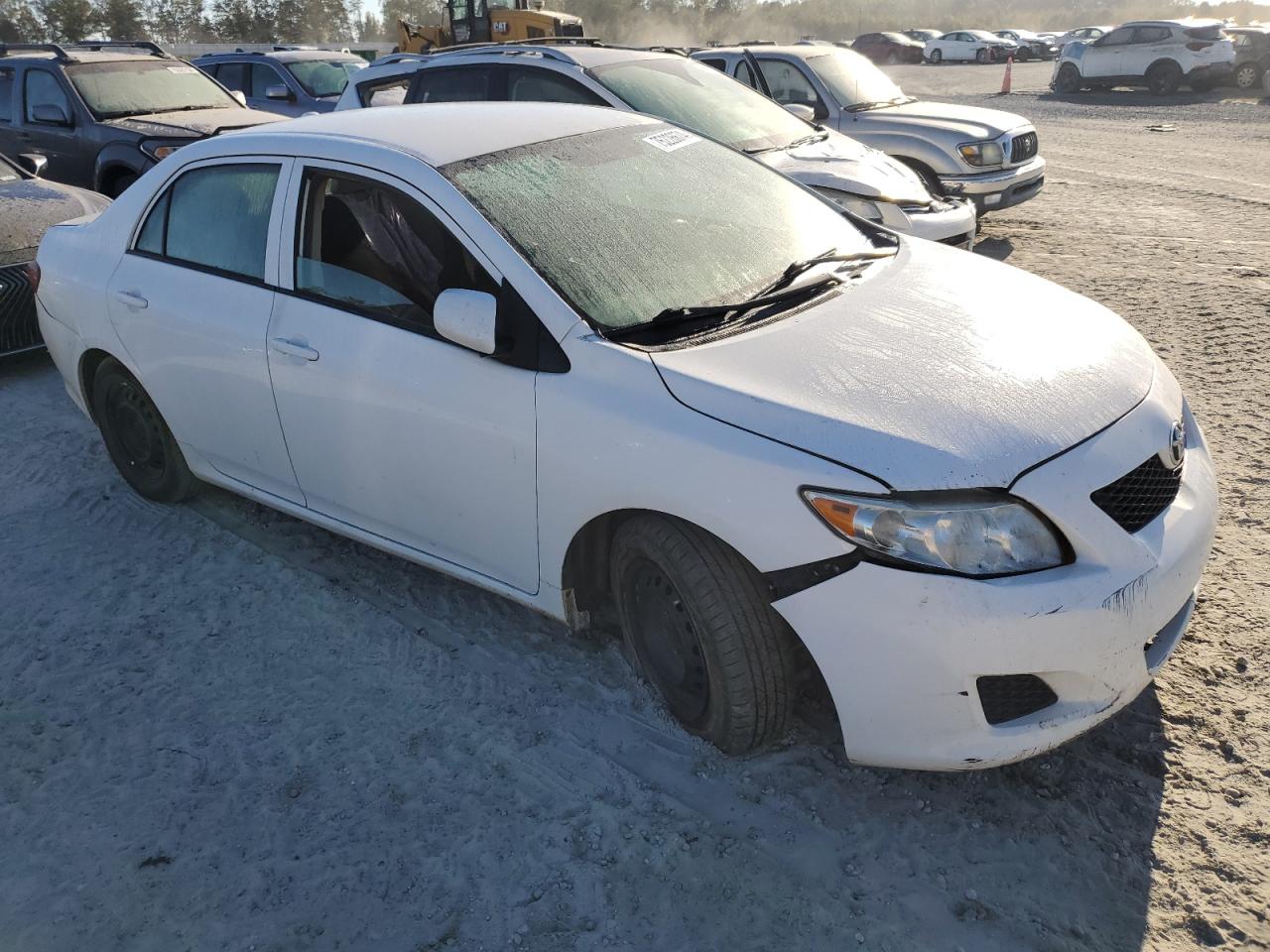 2010 Toyota Corolla VIN 2T1BU4EE9AC516602 Copart auction photo, water/flood damage thumbnail 4