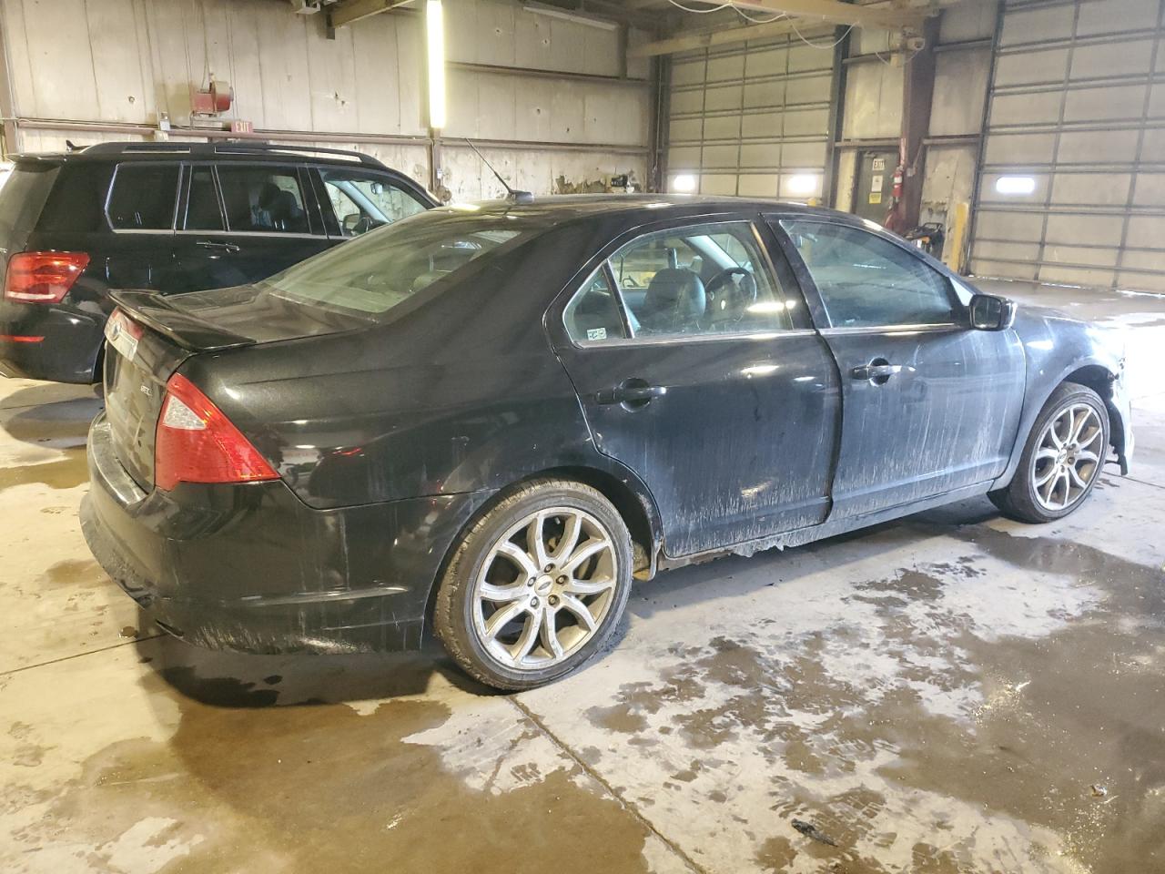 2012 Ford Fusion VIN 3FAHP0JA8CR229588 Copart auction photo, all over / undercarriage damage thumbnail 3