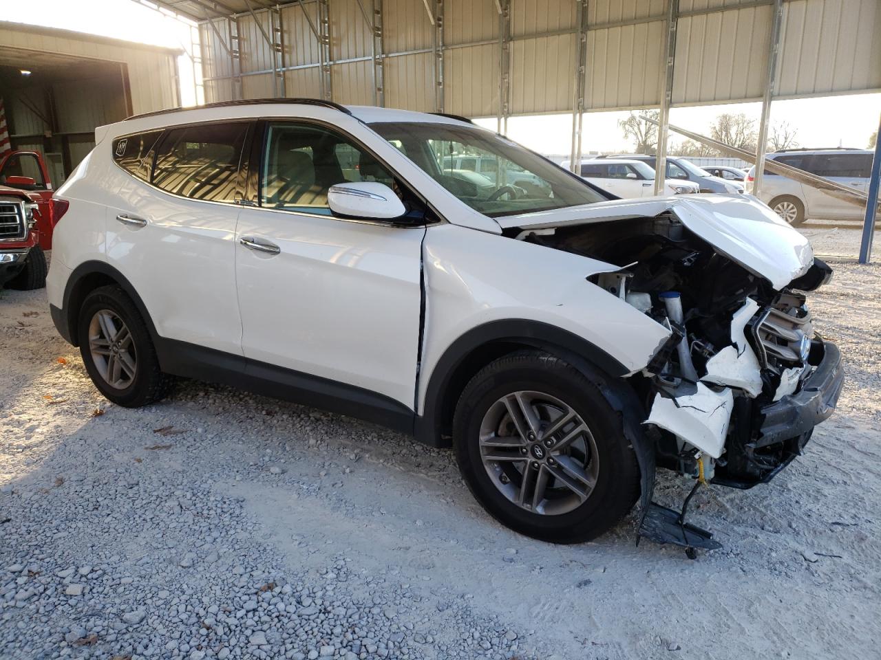 2018 Hyundai Santa Fe VIN 5NMZUDLB2JH063392 Copart auction photo, front end / side damage thumbnail 4