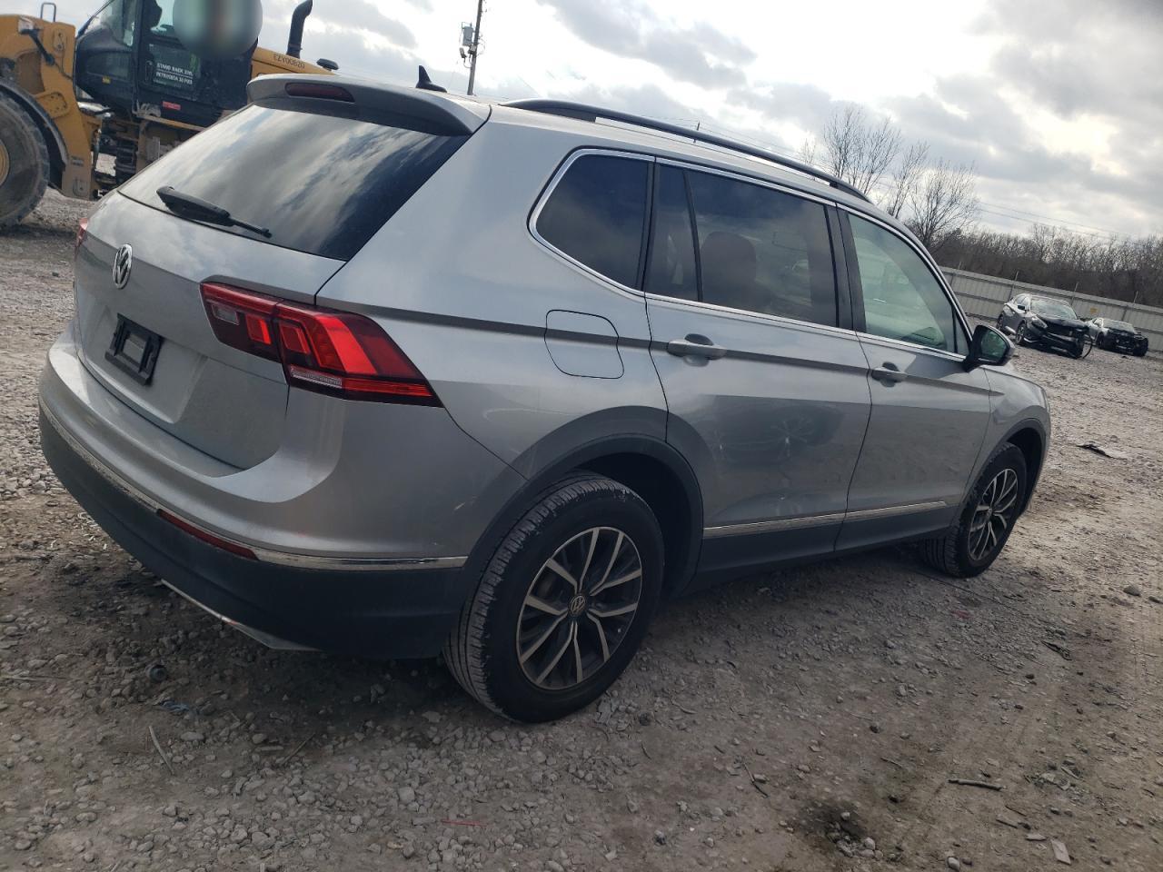 2020 Volkswagen Tiguan VIN 3VV3B7AX0LM075621 Copart auction photo, side damage thumbnail 3