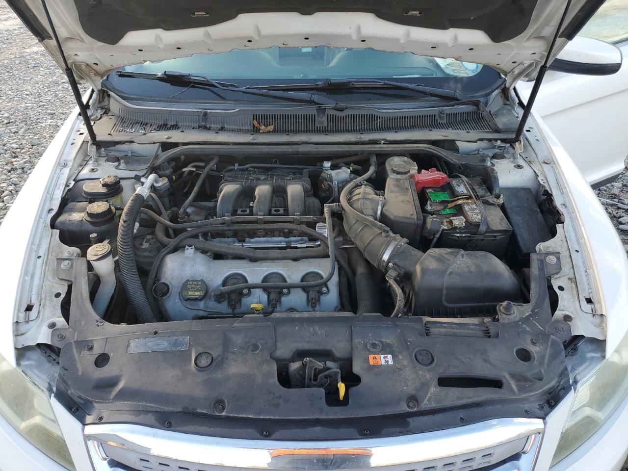 2012 Ford Taurus VIN 1FAHP2EW1CG112010 Copart auction photo, water/flood damage thumbnail 11