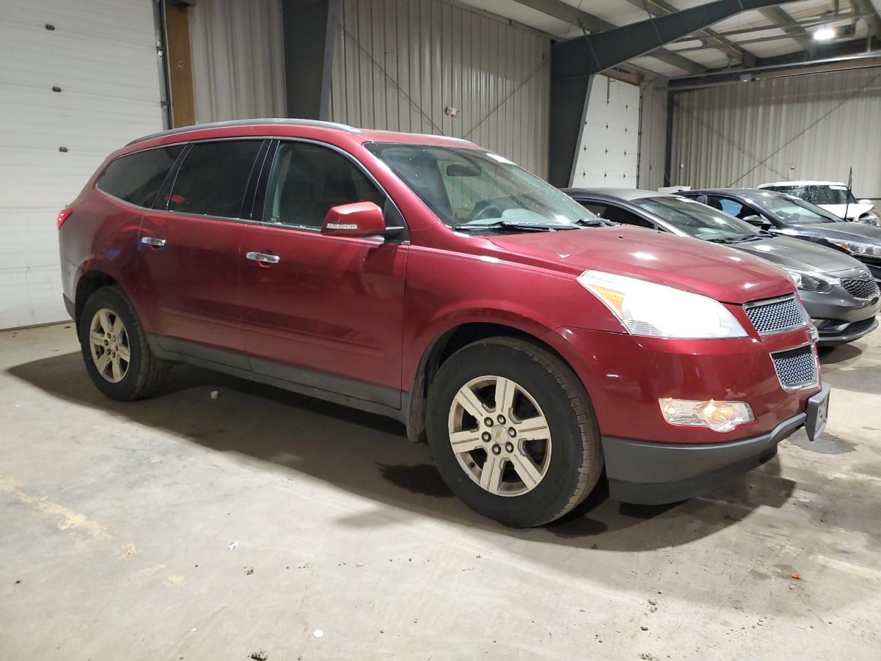 2010 Chevrolet Traverse VIN 1GNLVFED6AJ233428 Copart auction photo, minor dent/scratches damage thumbnail 4
