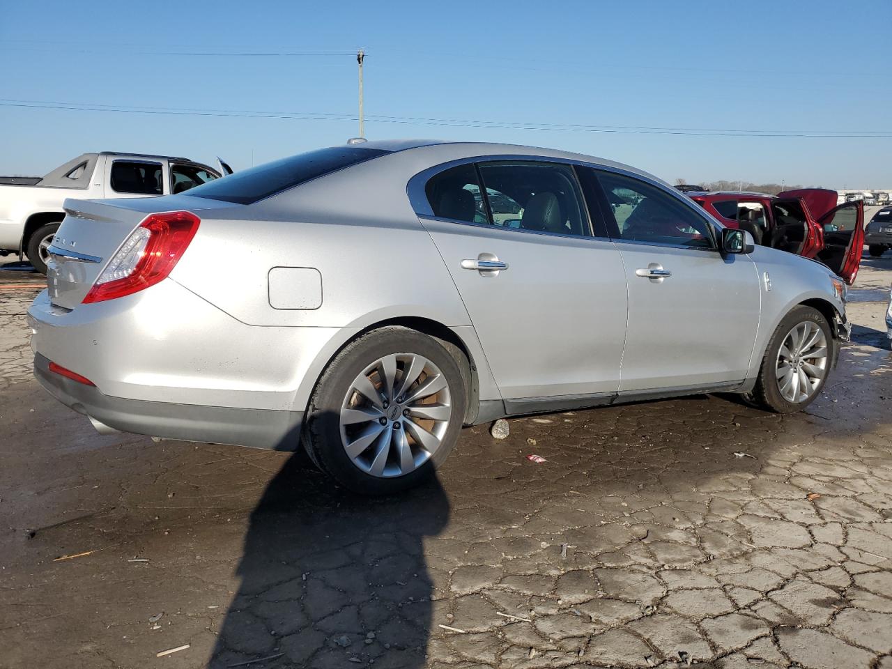 2015 Lincoln MKS VIN 1LNHL9DK3FG602199 Copart auction photo, front end damage thumbnail 3