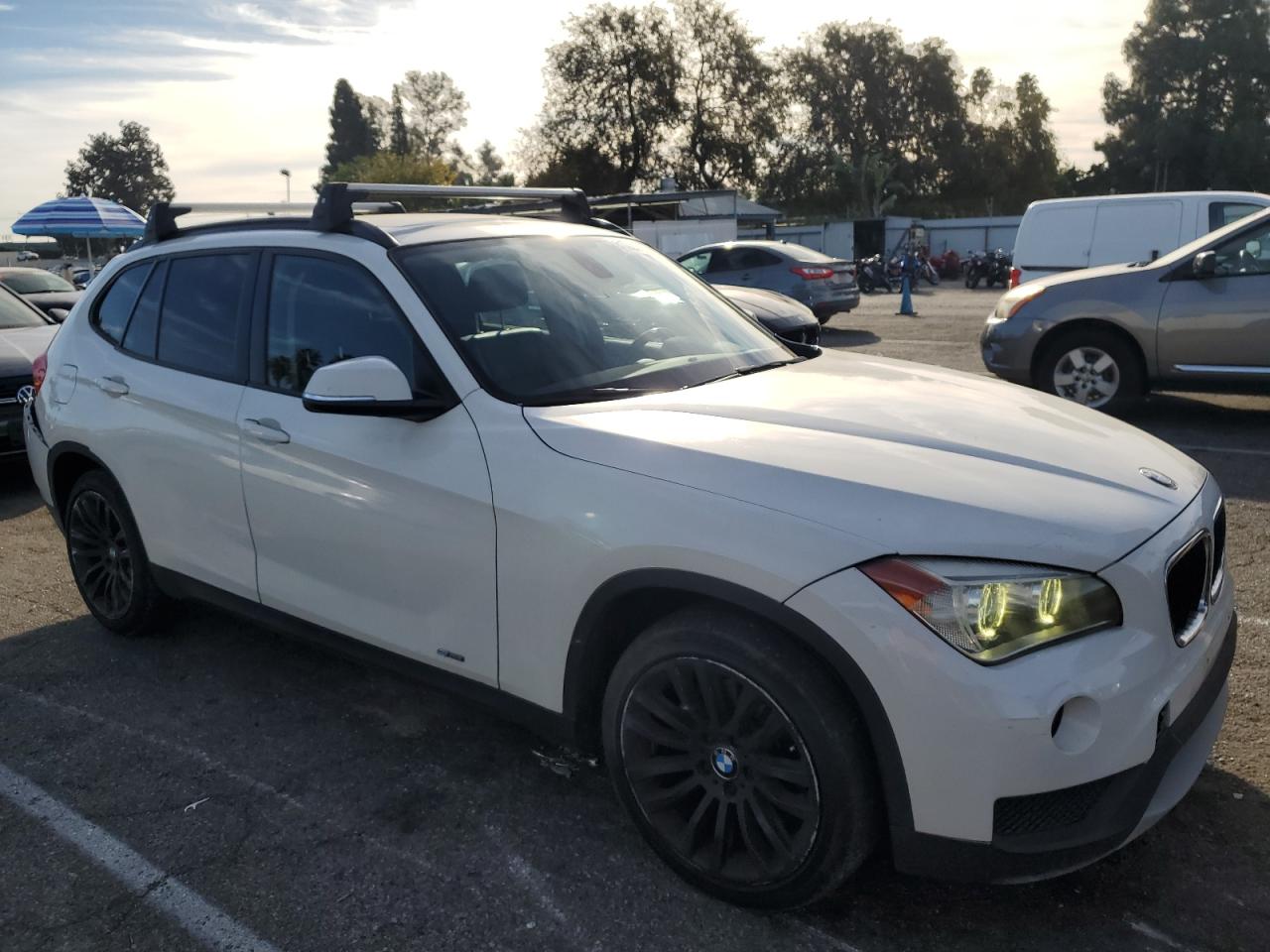 2014 BMW X1 VIN WBAVM1C50EVW55158 Copart auction photo, minor dent/scratches damage thumbnail 4