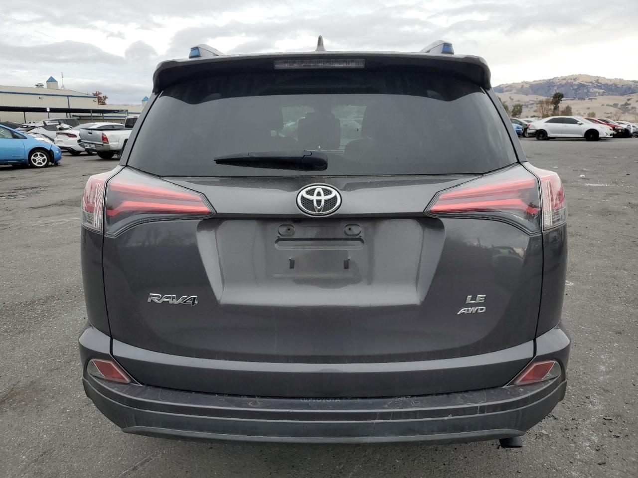 2017 Toyota RAV 4 VIN JTMBFREV2HJ126396 Copart auction photo, undercarriage / side damage thumbnail 6