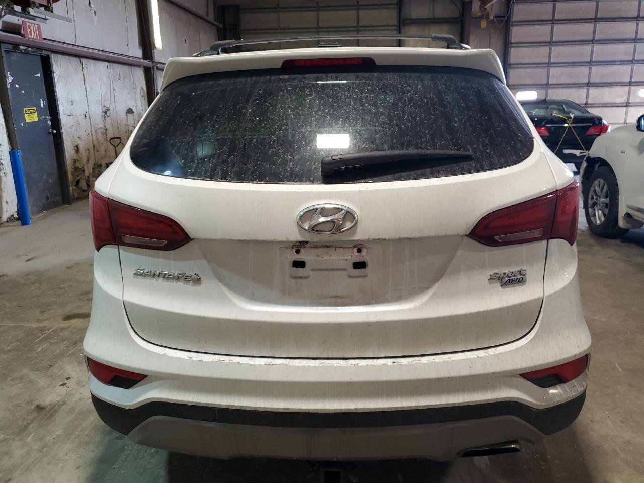 2017 Hyundai Santa Fe VIN 5NMZUDLB0HH021877 Copart auction photo, front end / minor dent/scratches damage thumbnail 6