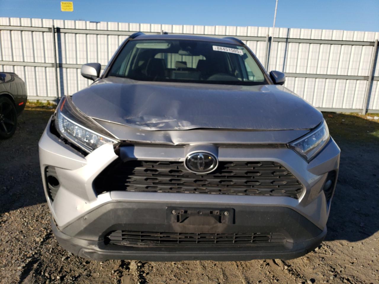 2019 Toyota RAV 4 VIN 2T3W1RFV9KC001923 Copart auction photo, front end / side damage thumbnail 5