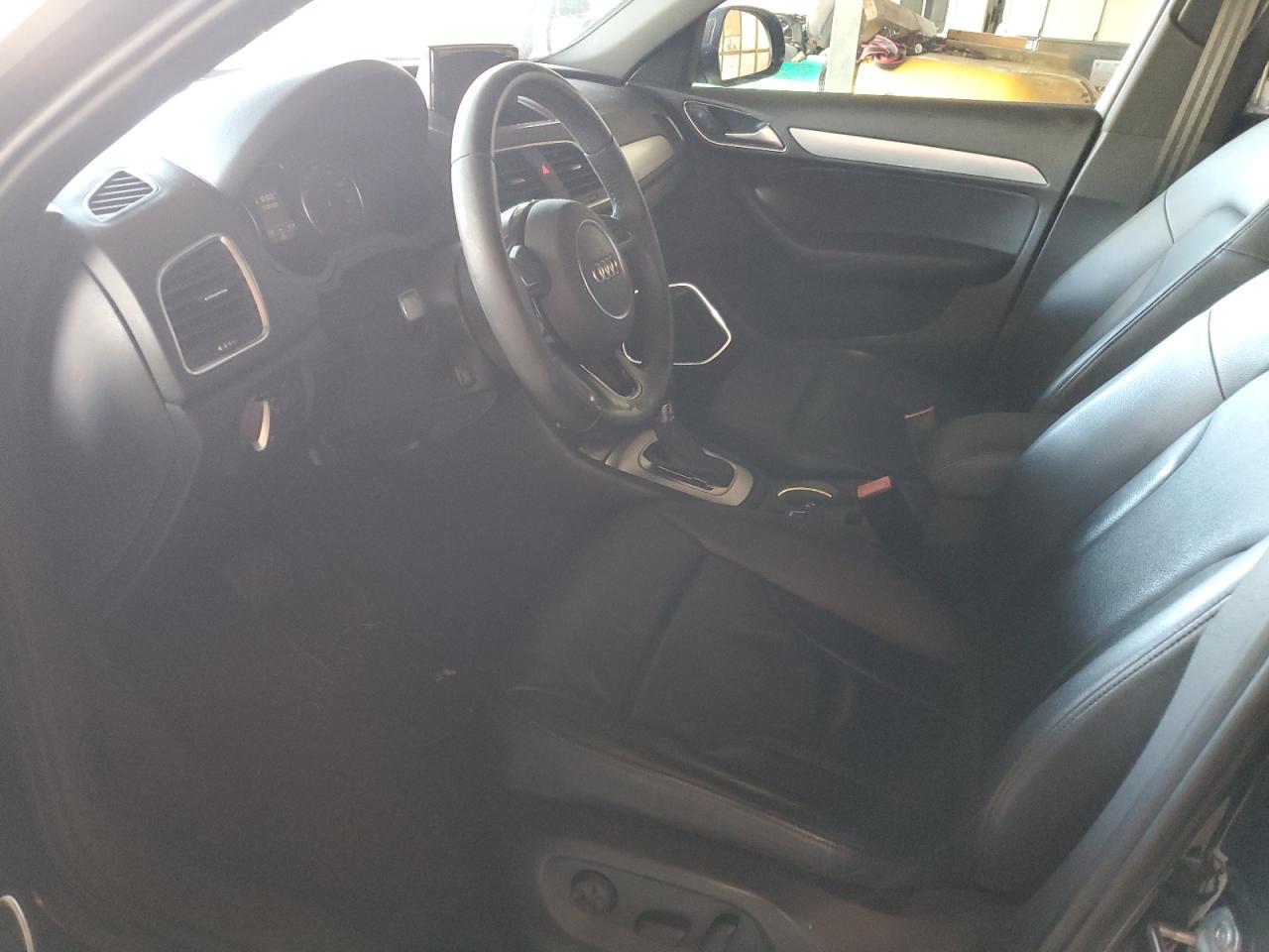 2015 Audi Q3 VIN WA1GFCFS4FR009015 Copart auction photo, front end / side damage thumbnail 7