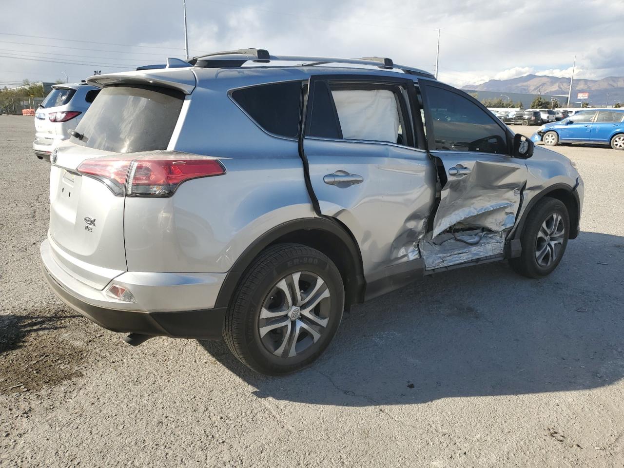 2018 Toyota RAV 4 VIN JTMZFREV1JJ181605 Copart auction photo, side damage thumbnail 3