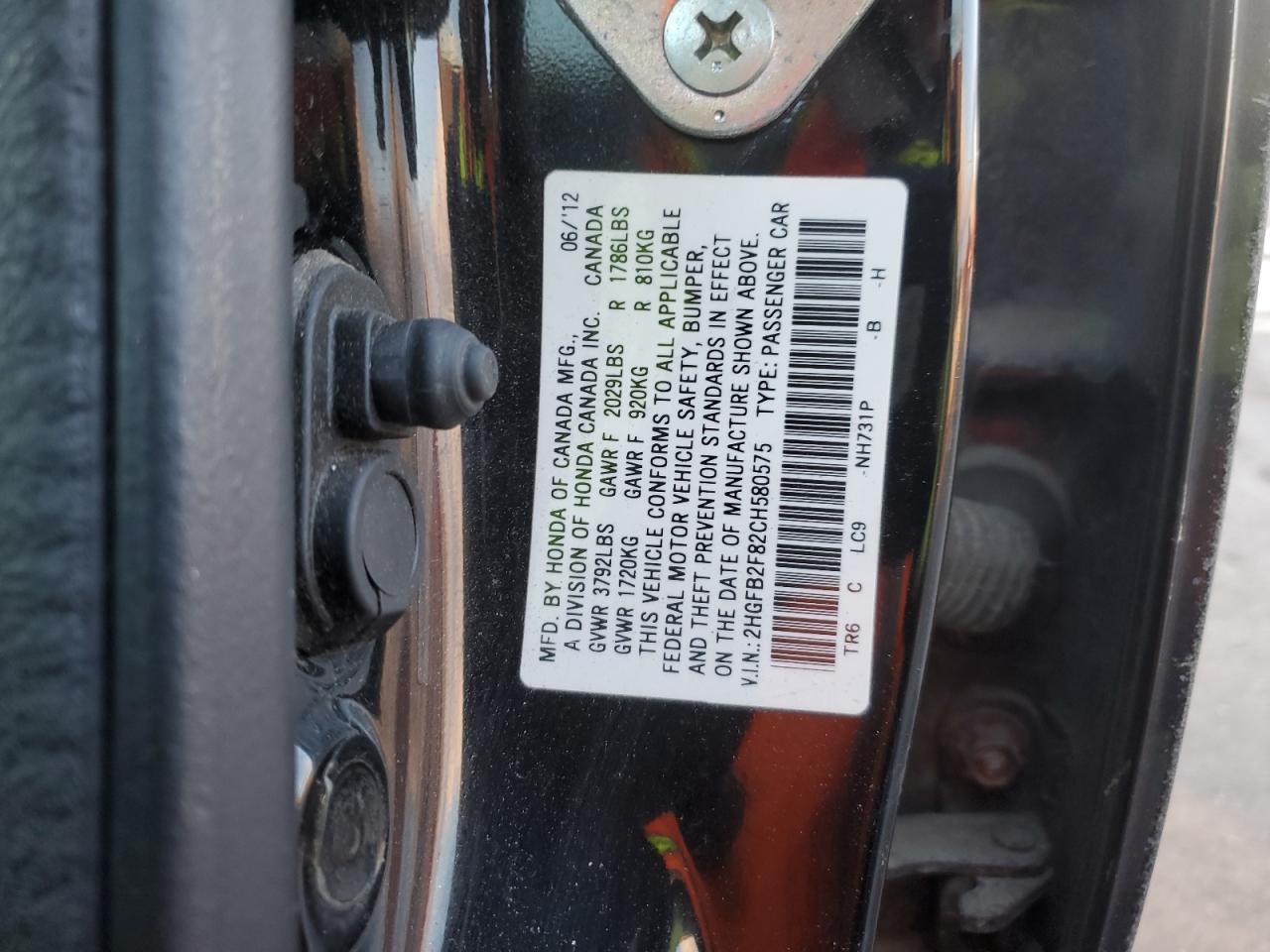2012 Honda Civic VIN 2HGFB2F82CH580575 Copart auction photo, undercarriage / minor dent/scratches damage thumbnail 12