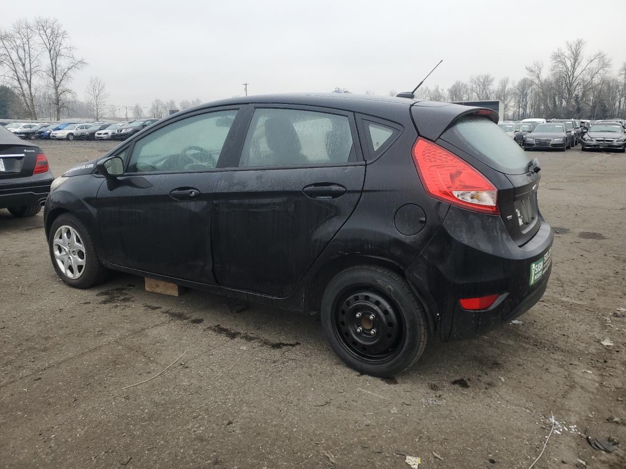 2012 Ford Fiesta VIN 3FADP4EJ8CM115670 Copart auction photo, front end / side damage thumbnail 2