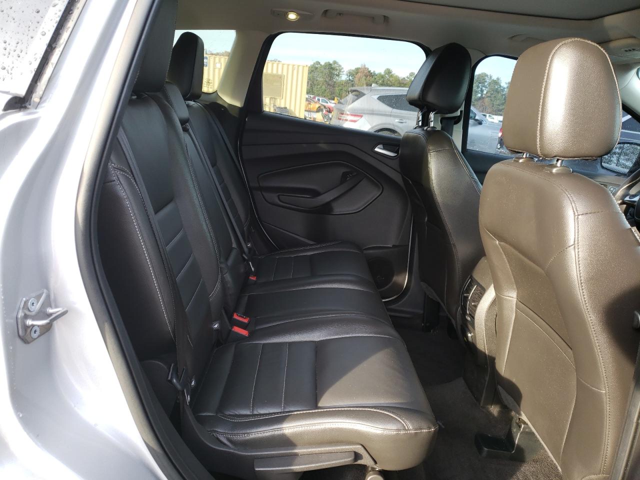 2016 Ford Escape VIN 1FMCU9J91GUA18881 Copart auction photo, side / undercarriage damage thumbnail 11