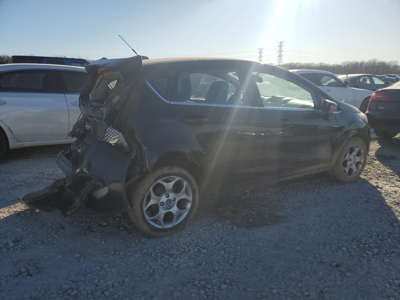 2012 Ford Fiesta VIN 3FADP4FJ1CM110809 Copart auction photo, rear end damage thumbnail 3