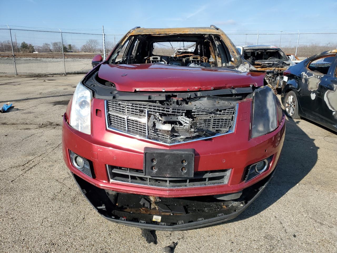 2011 Cadillac SRX VIN 3GYFNEEY8BS535199 Copart auction photo, burn damage thumbnail 5