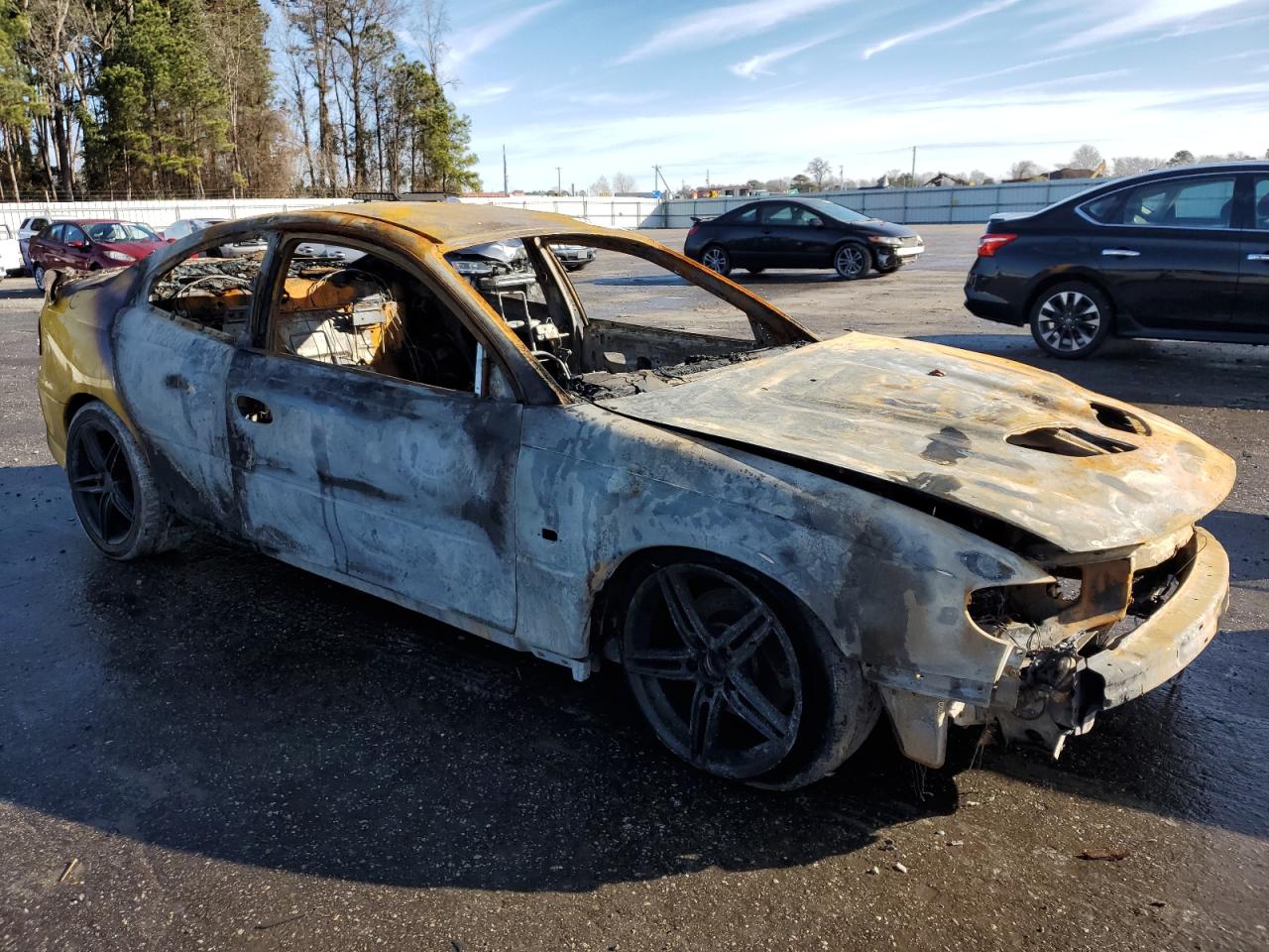 2005 Pontiac GTO VIN 6G2VX12UX5L349106 Copart auction photo, burn / burn - interior damage thumbnail 4