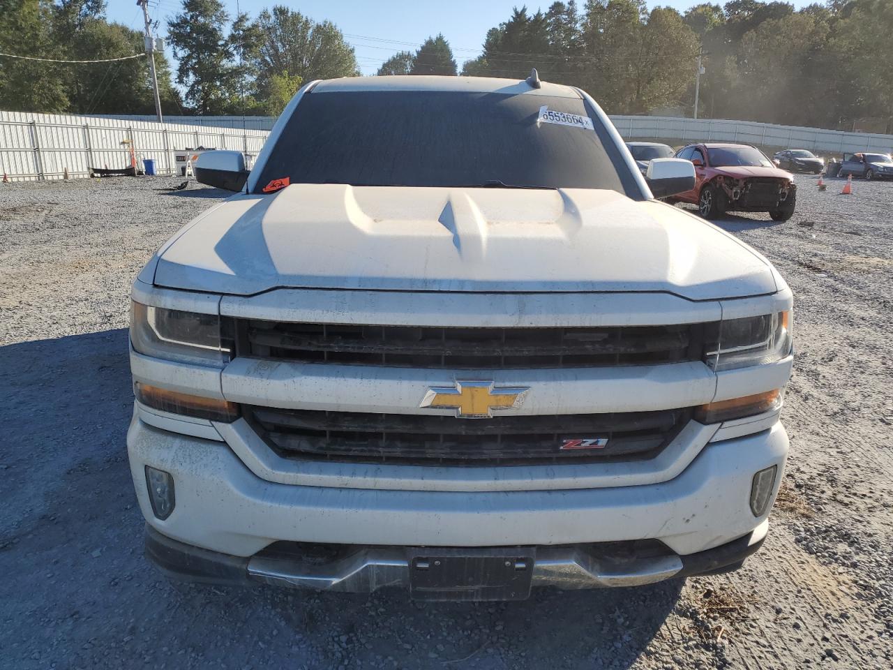 2018 Chevrolet Silverado VIN 3GCUKREC0JG457200 Copart auction photo, water/flood damage thumbnail 5