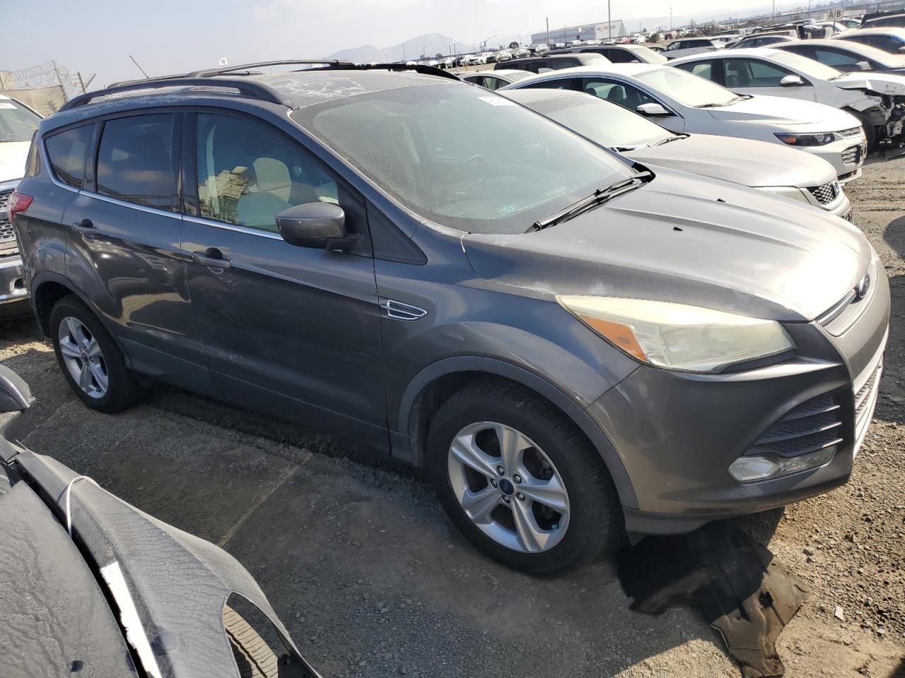 2014 Ford Escape VIN 1FMCU0GX5EUC00212 Copart auction photo, minor dent/scratches damage thumbnail 4
