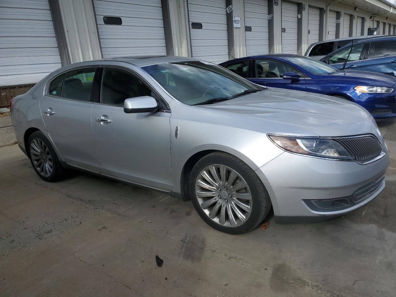 2013 Lincoln MKS VIN 1LNHL9DK1DG604272 Copart auction photo, front end damage thumbnail 4