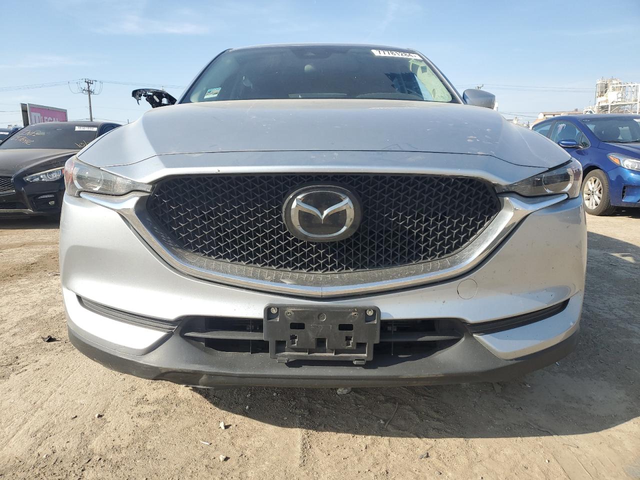 2021 Mazda CX-5 VIN JM3KFBCM7M0339840 Copart auction photo, side / rear end damage thumbnail 5