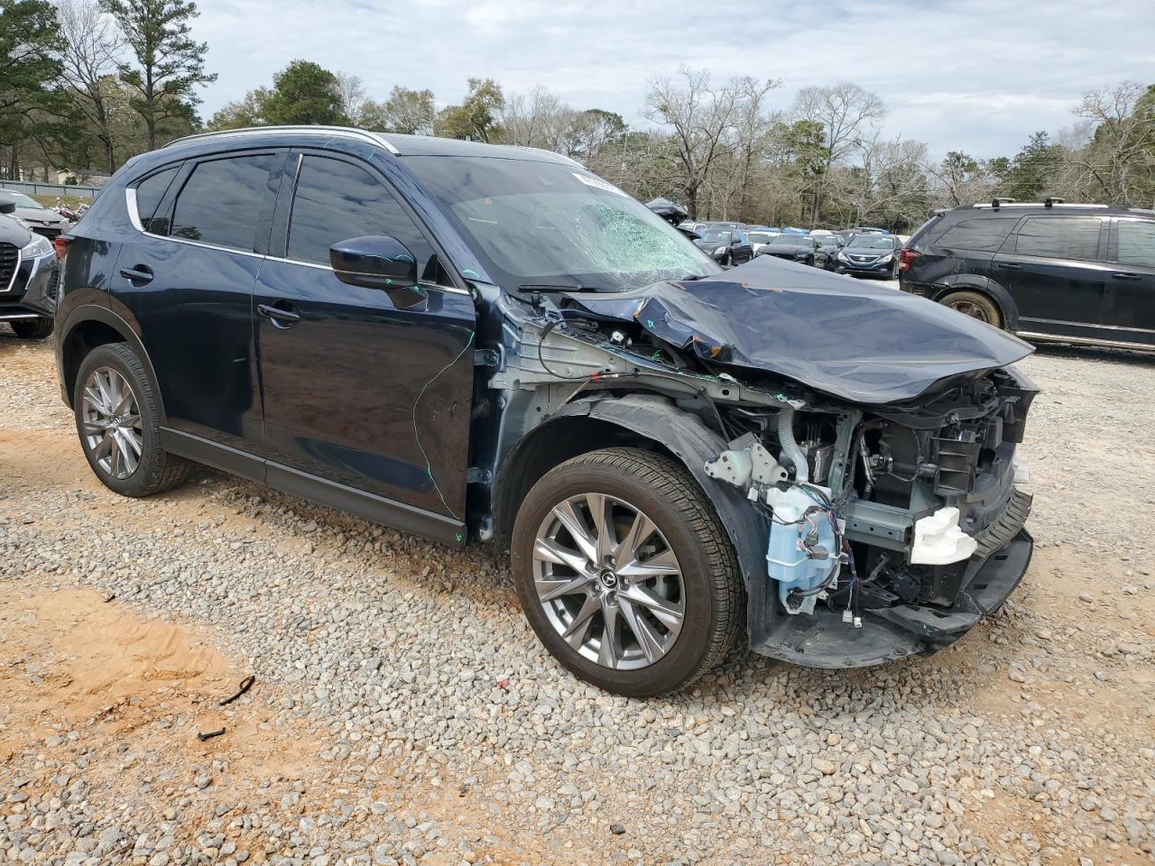 2021 Mazda CX-5 VIN JM3KFBDM1M1494375 Copart auction photo, side / front end damage thumbnail 4