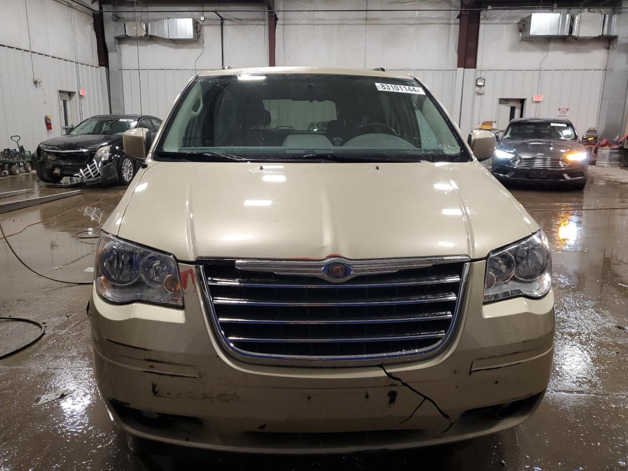 2010 Chrysler Town & Country VIN 2A4RR5DX1AR442093 Copart auction photo, front end damage thumbnail 5