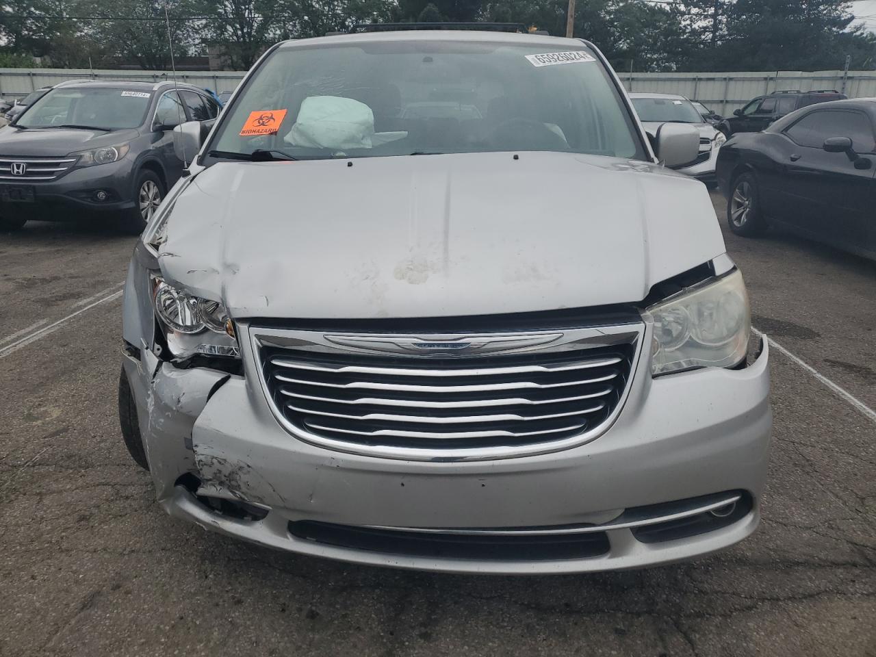 2012 Chrysler Town & Country VIN 2C4RC1BG0CR140154 Copart auction photo, front end damage thumbnail 5
