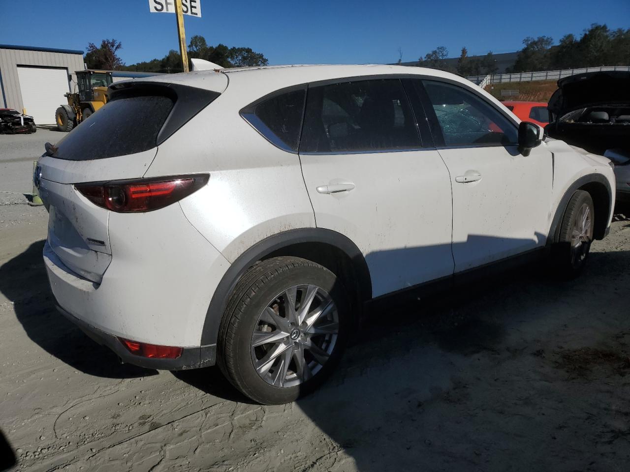 2021 Mazda CX-5 VIN JM3KFBDM6M1390237 Copart auction photo, top/roof damage thumbnail 3