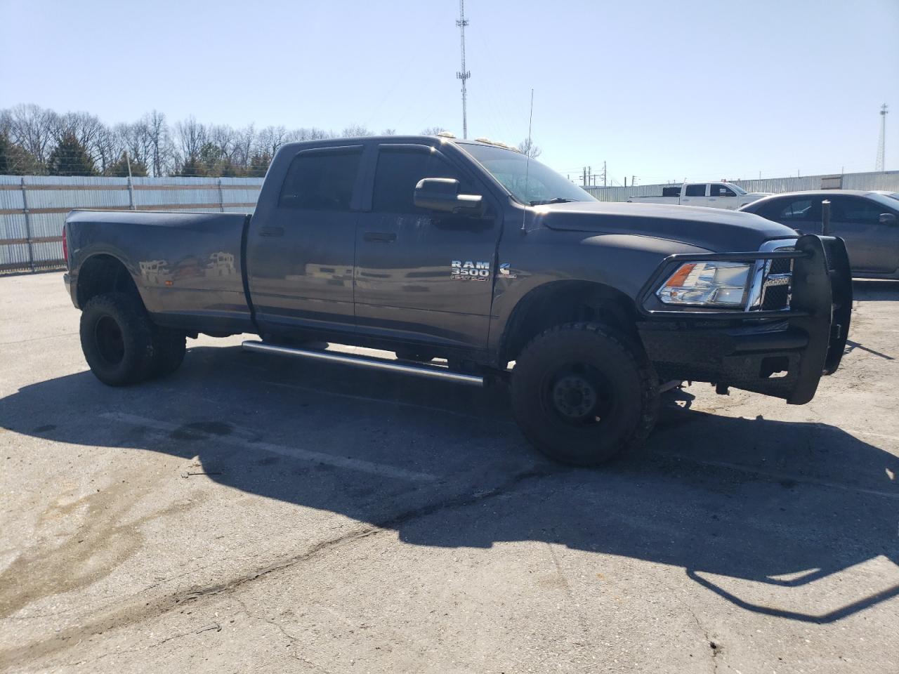 2016 RAM 3500 VIN 3C63RRGLXGG318762 Copart auction photo, front end / hail damage thumbnail 4
