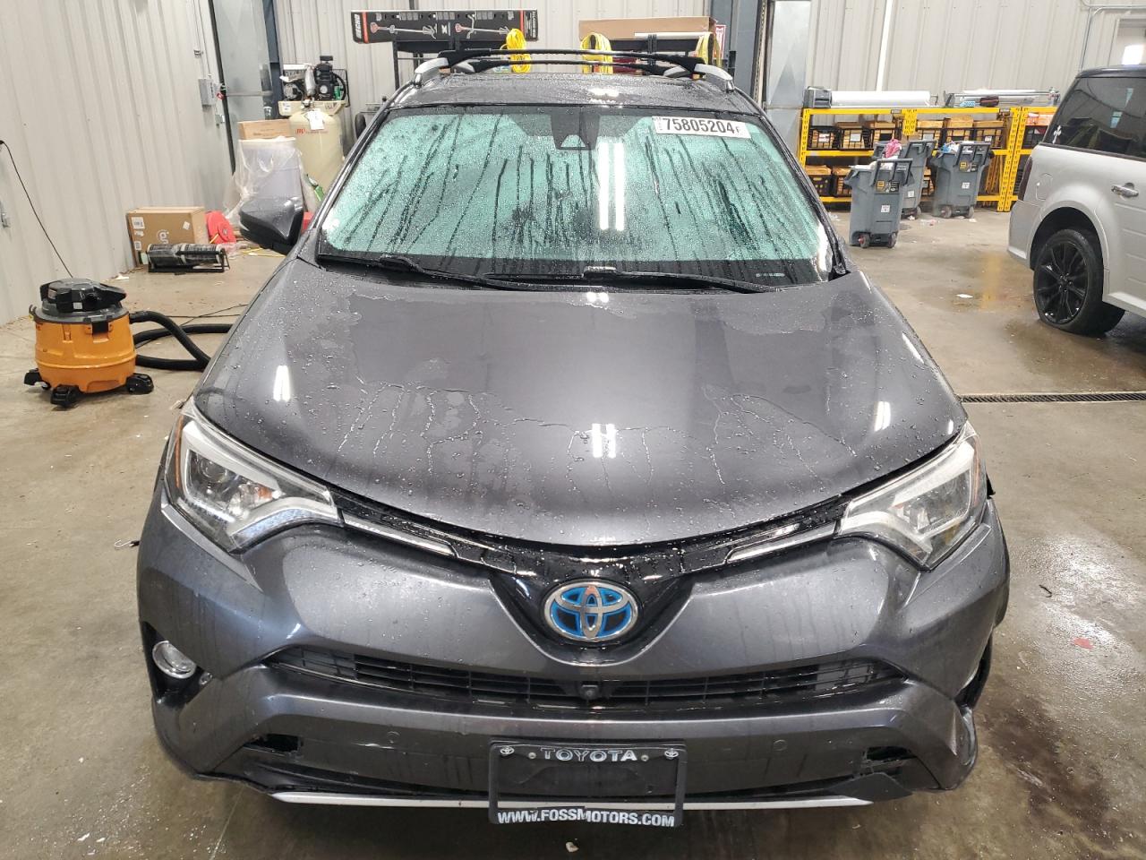 2016 Toyota RAV 4 VIN JTMDJREV4GD005373 Copart auction photo, side / front end damage thumbnail 5