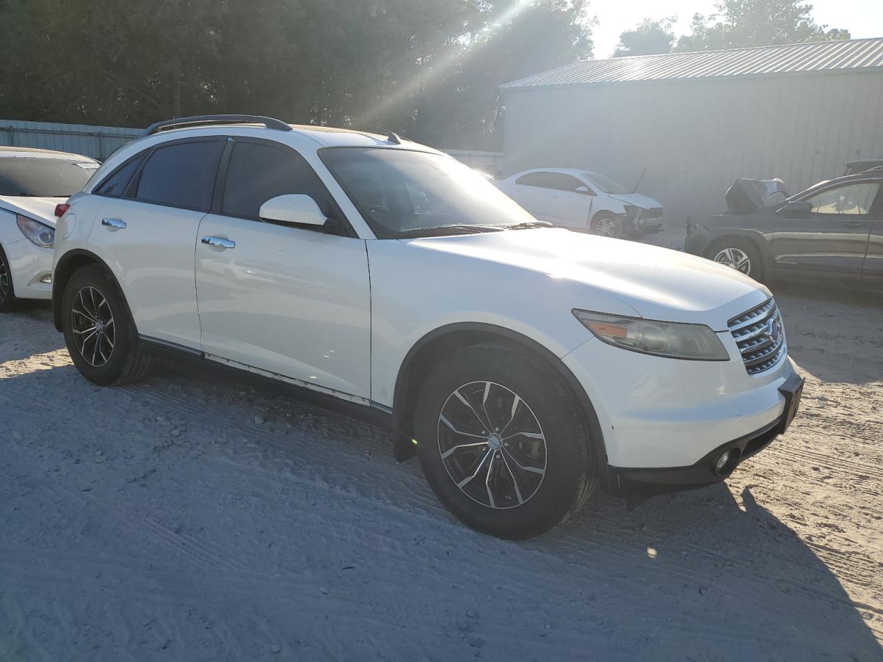 2004 Infiniti FX VIN JNRAS08U24X101219 Copart auction photo, side damage thumbnail 4