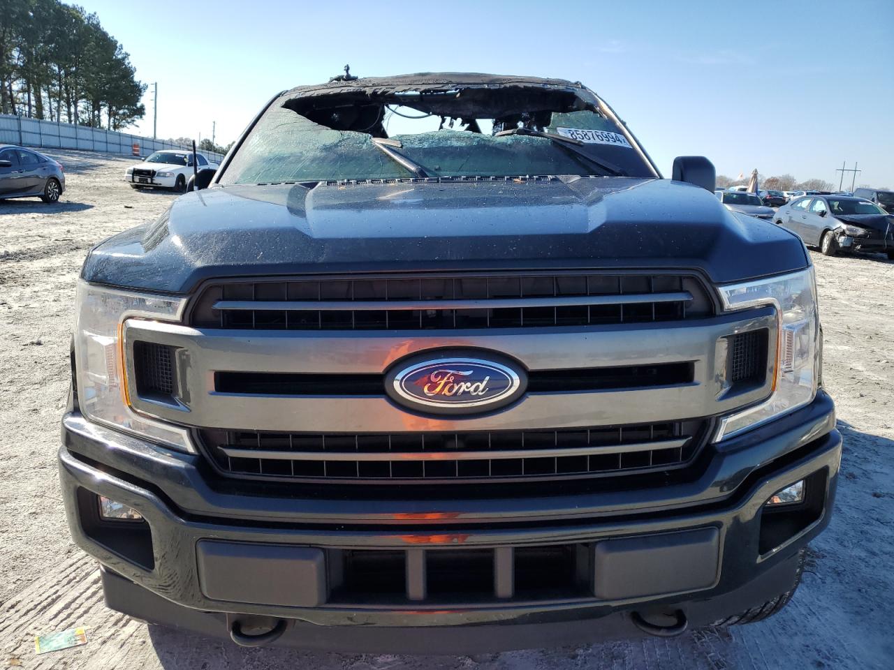 2018 Ford F-150 VIN 1FTEW1EP4JFC87633 Copart auction photo, burn damage thumbnail 5
