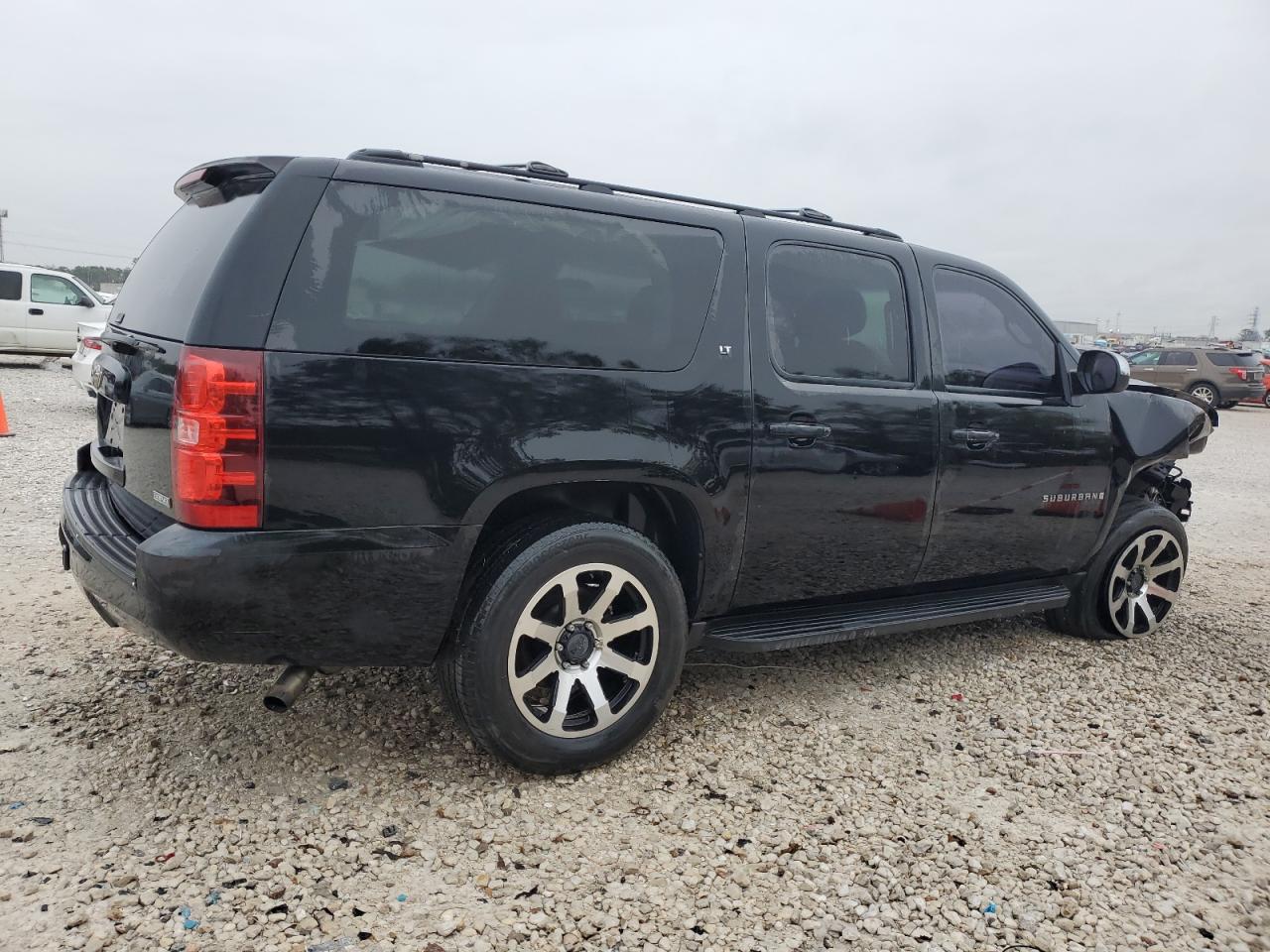 2009 Chevrolet Suburban VIN 1GNFC26089R234231 Copart auction photo, front end / side damage thumbnail 3