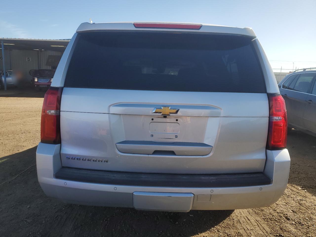 2016 Chevrolet Suburban VIN 1GNSKHKC1GR224626 Copart auction photo, front end damage thumbnail 6