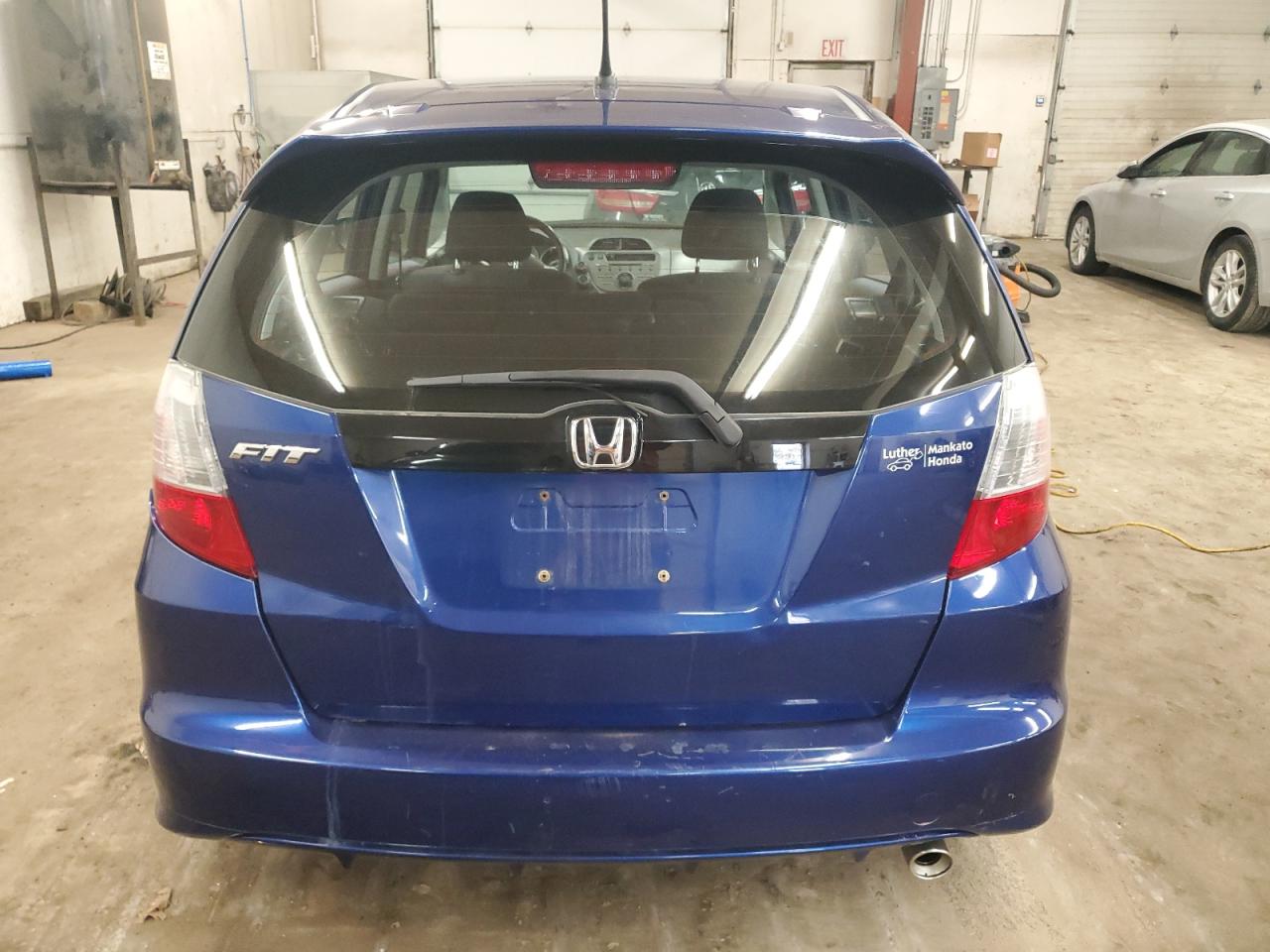 2010 Honda Fit VIN JHMGE8H48AS028199 Copart auction photo, rear end damage thumbnail 6