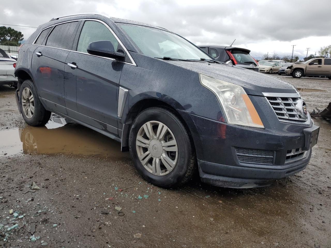 2016 Cadillac SRX VIN 3GYFNEE3XGS516570 Copart auction photo, front end / side damage thumbnail 4