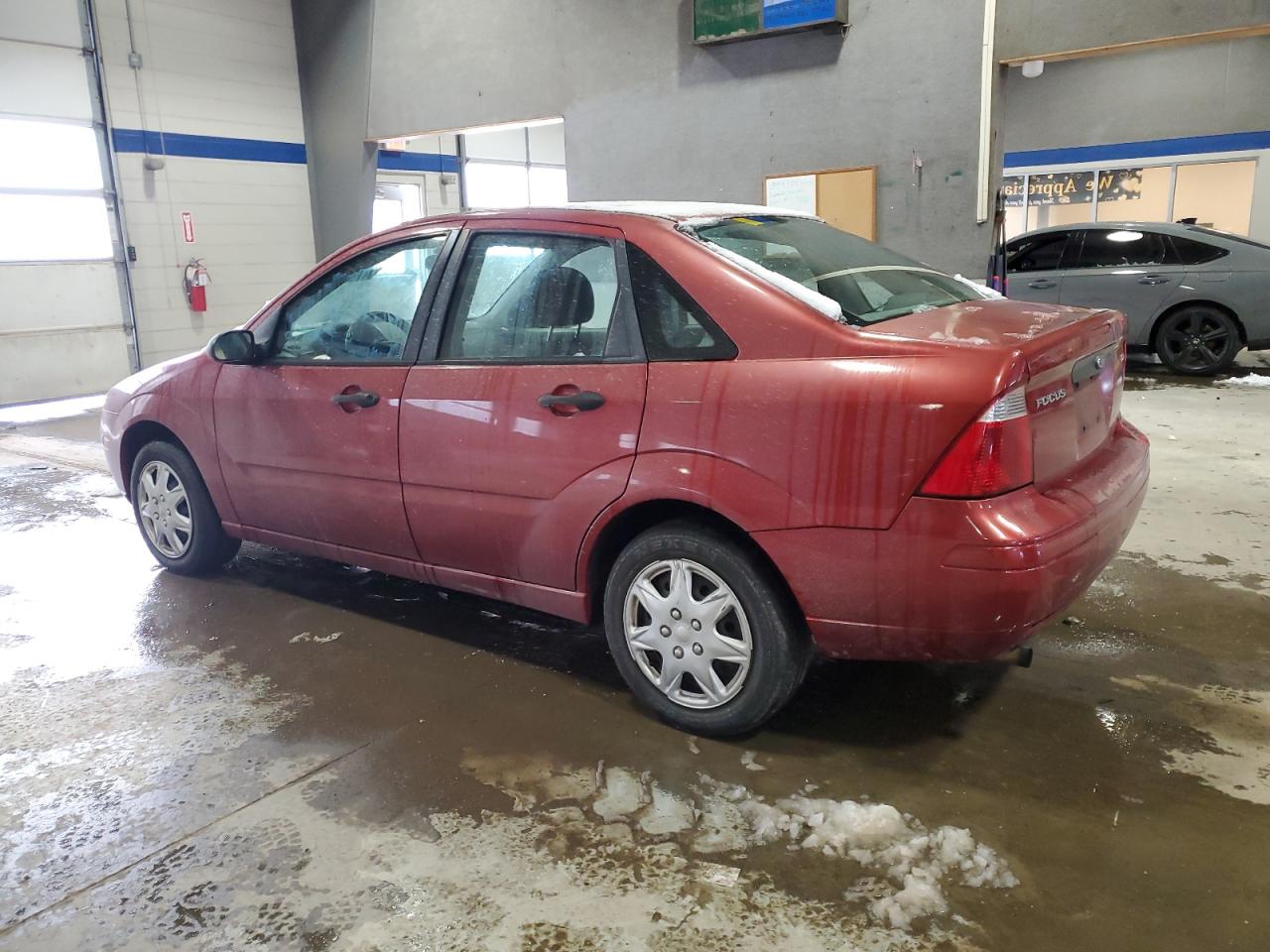 2005 Ford Focus VIN 1FAFP34N35W105963 Copart auction photo, all over / minor dent/scratches damage thumbnail 2