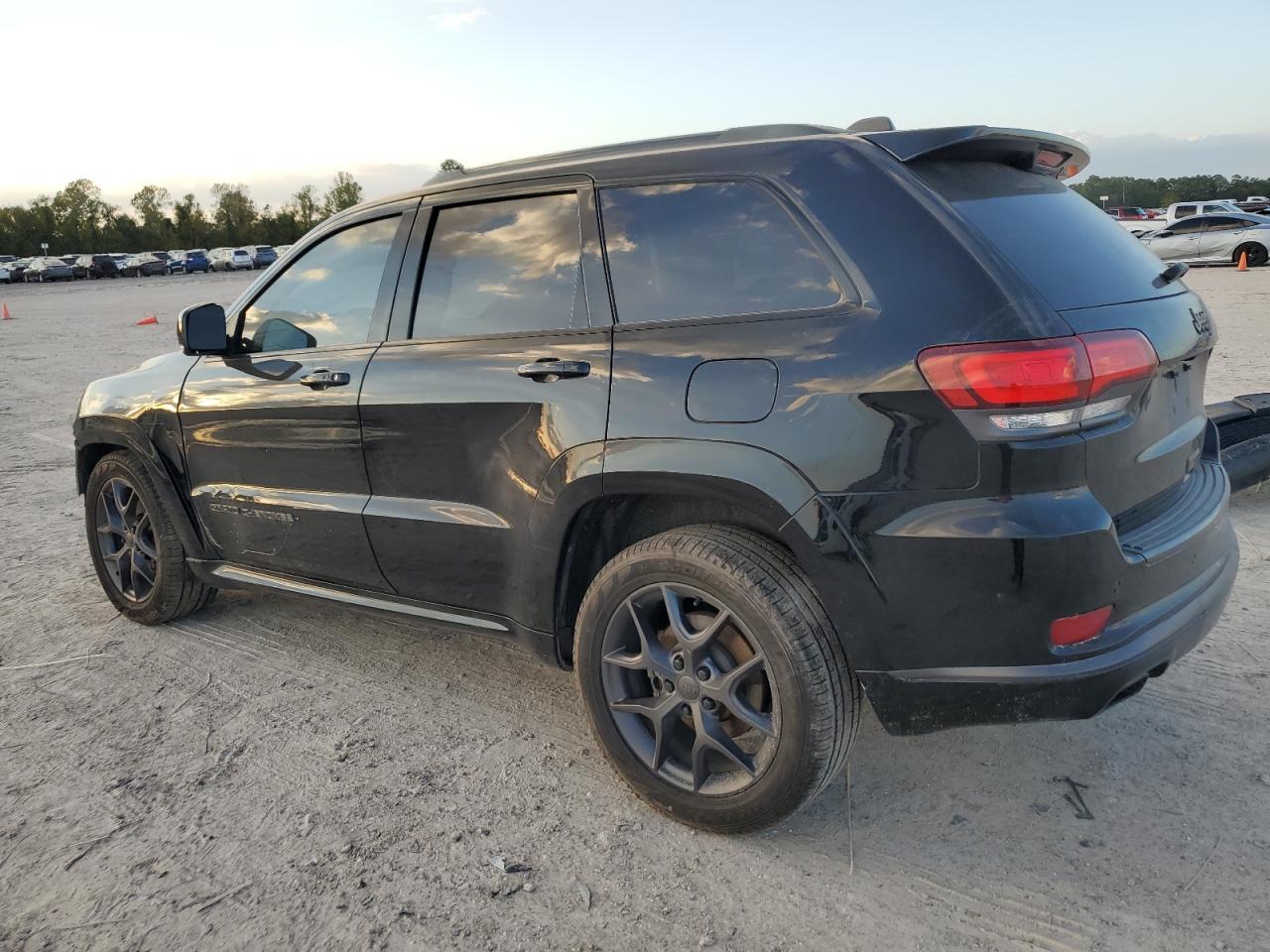 2020 Jeep Grand Cherokee VIN 1C4RJEBG4LC219428 Copart auction photo, side / front end damage thumbnail 2