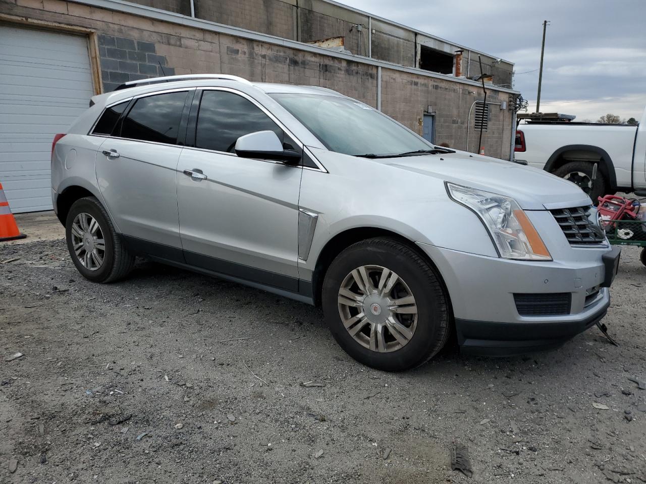 2013 Cadillac SRX VIN 3GYFNCE32DS640042 Copart auction photo, rear end / minor dent/scratches damage thumbnail 4