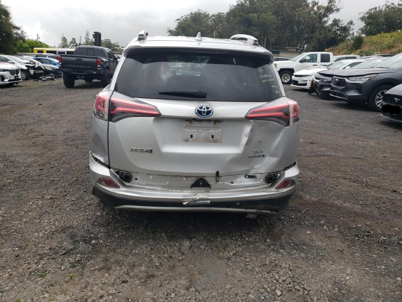 2016 Toyota RAV 4 VIN JTMRJREV2GD010867 Copart auction photo, rear end damage thumbnail 6